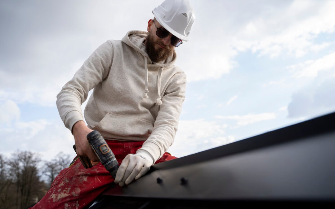 a man working at roof with protection helmet